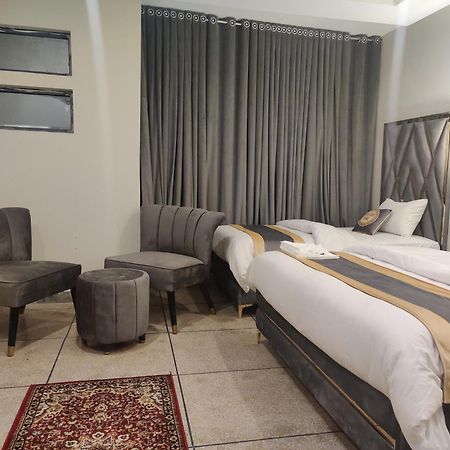 Hotel Swiss Pearl Lahore Buitenkant foto