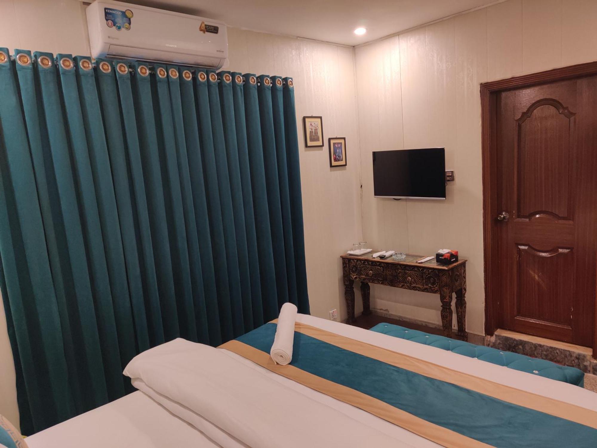 Hotel Swiss Pearl Lahore Kamer foto