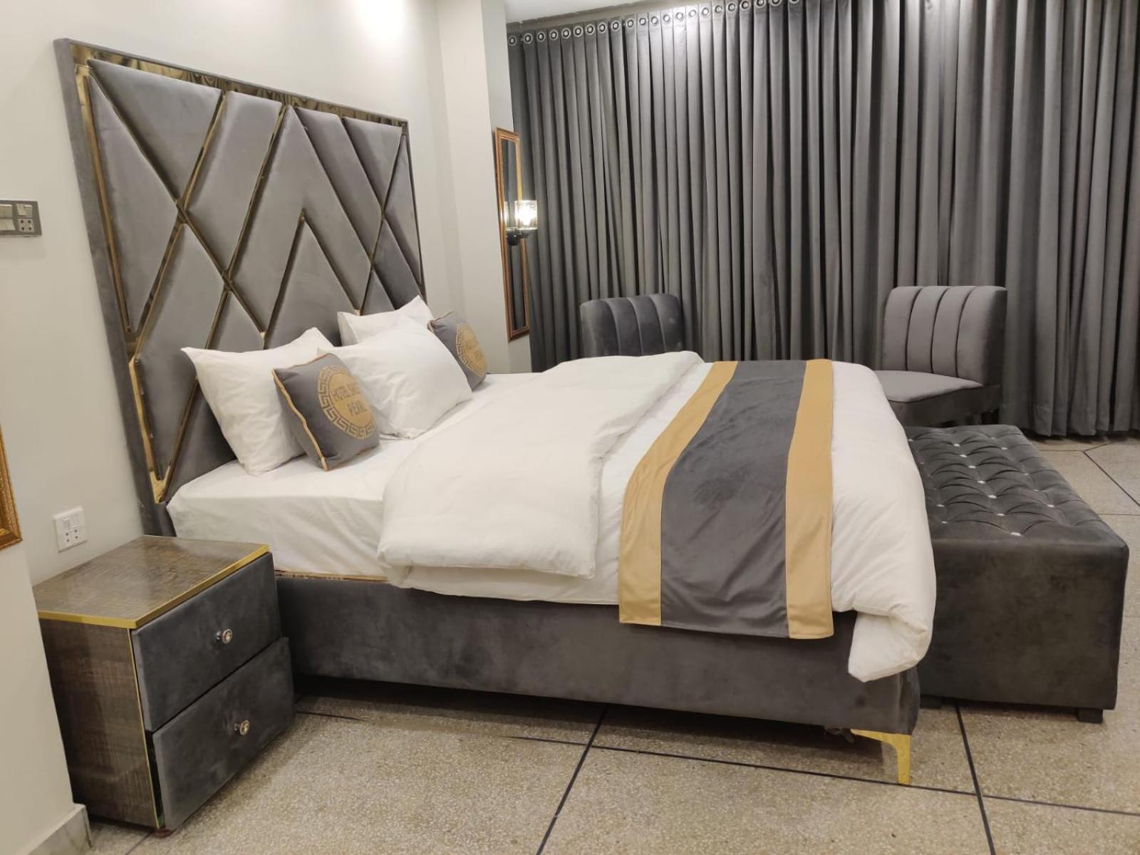 Hotel Swiss Pearl Lahore Kamer foto