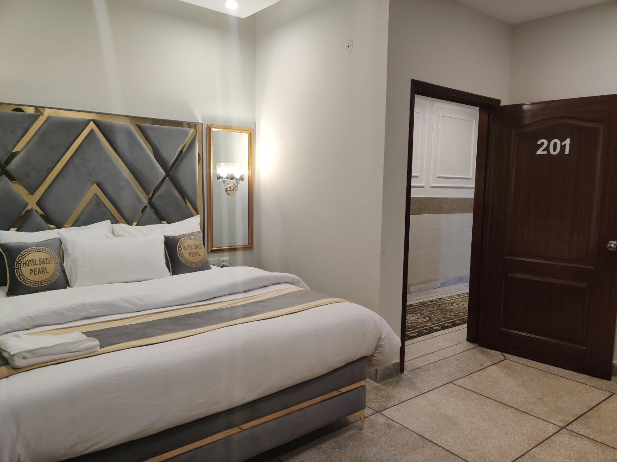 Hotel Swiss Pearl Lahore Kamer foto