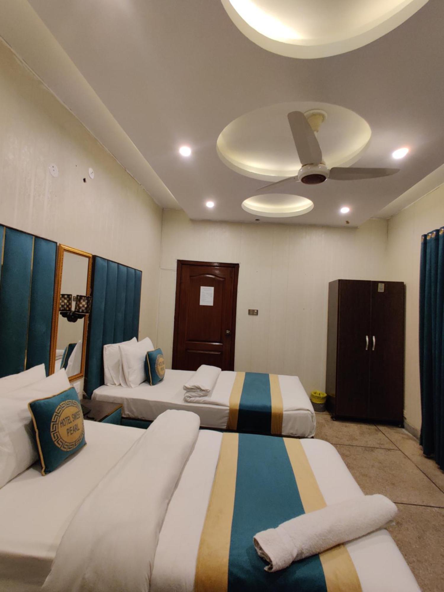 Hotel Swiss Pearl Lahore Kamer foto