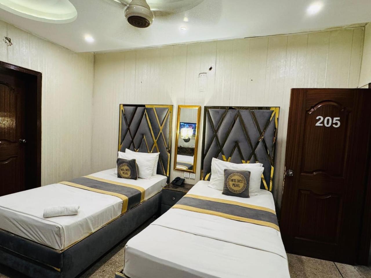 Hotel Swiss Pearl Lahore Kamer foto