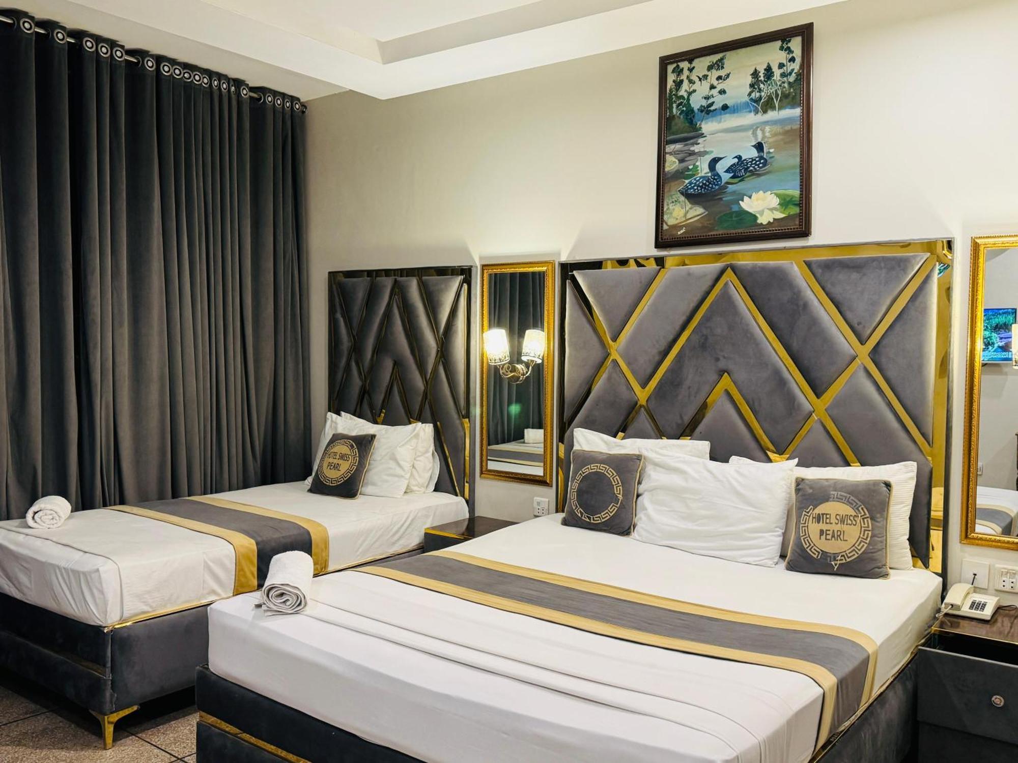 Hotel Swiss Pearl Lahore Kamer foto