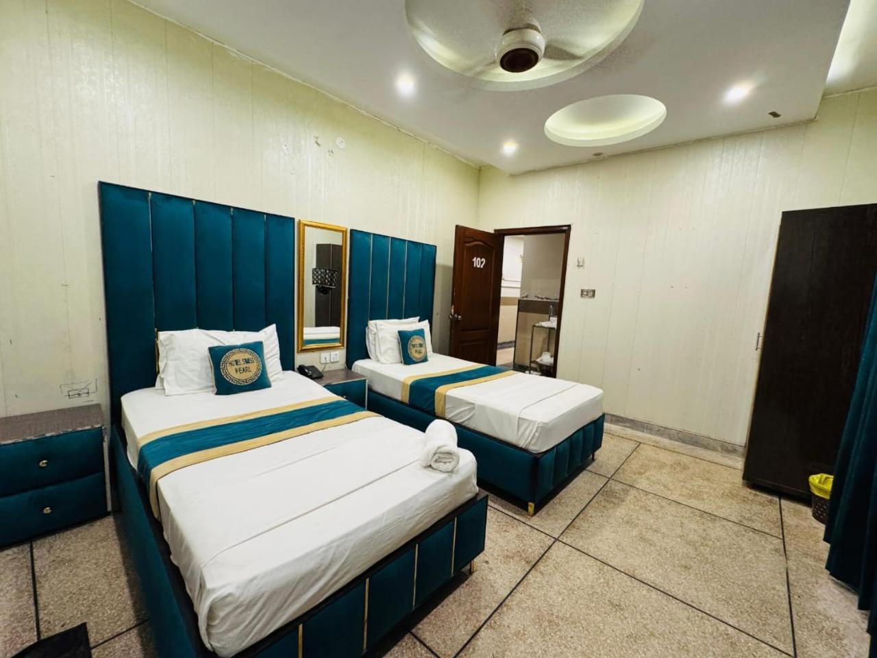 Hotel Swiss Pearl Lahore Kamer foto